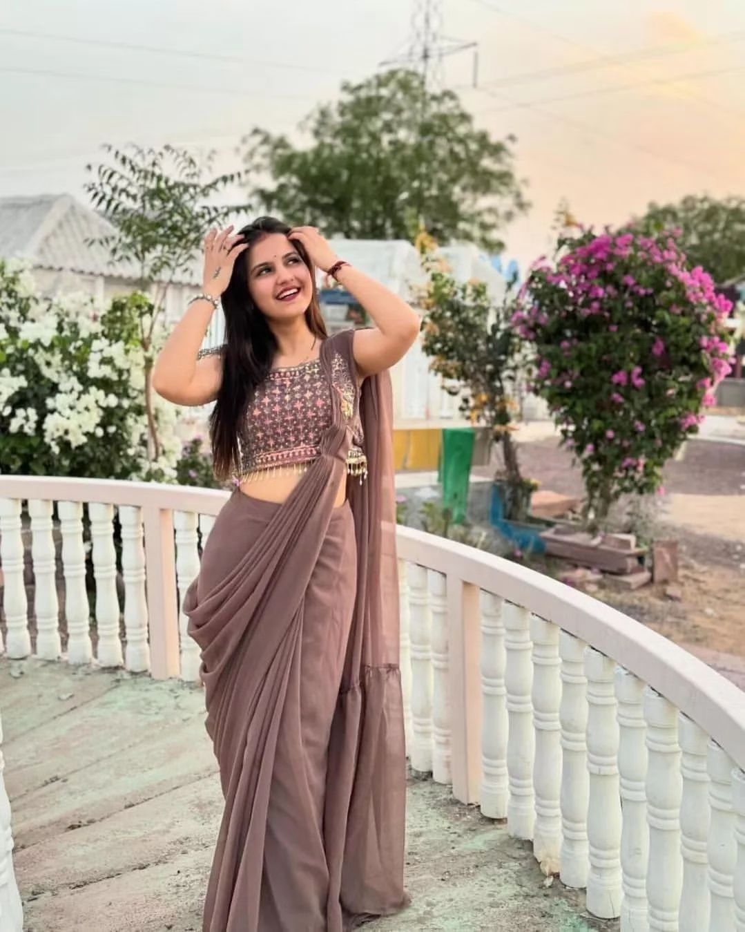 "Glam Up in Style: Stunning Faux Georgette Ready-to-Wear Saree with Ruffles & Patchwork Blouse"