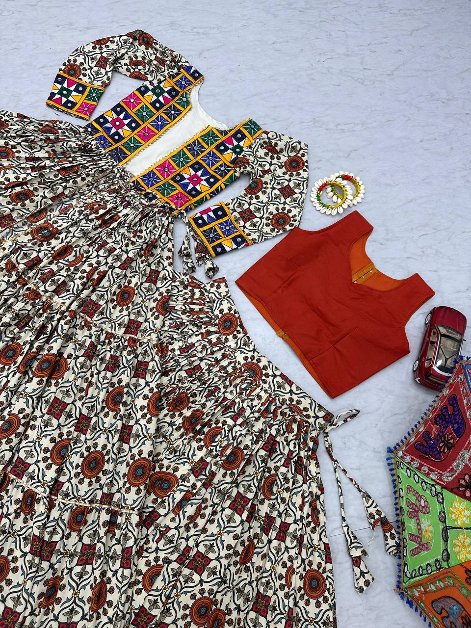 6 Meter Flair Navratri Special Lehenga Choli with Embroidered Shrug
