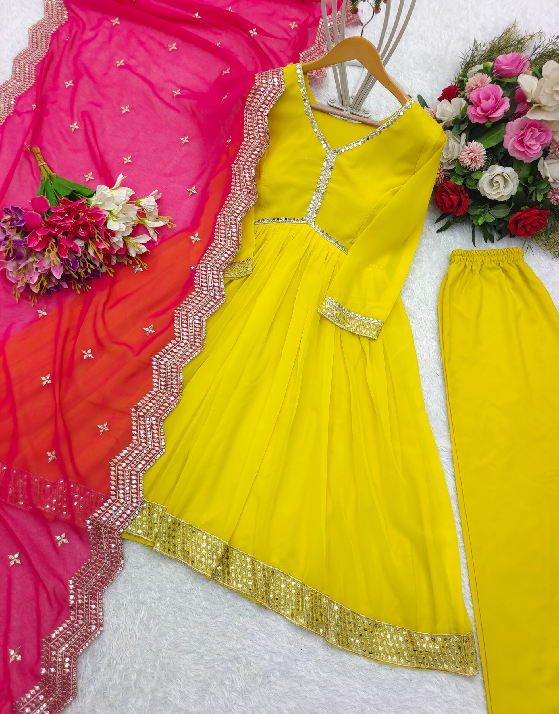 Lemon Yellow Heavy Fox Georgette Gown with Pants & Dupatta Set Nilormy Lemon Yellow Heavy Fox Georgette Gown with Pants & Dupatta Set Nilormy