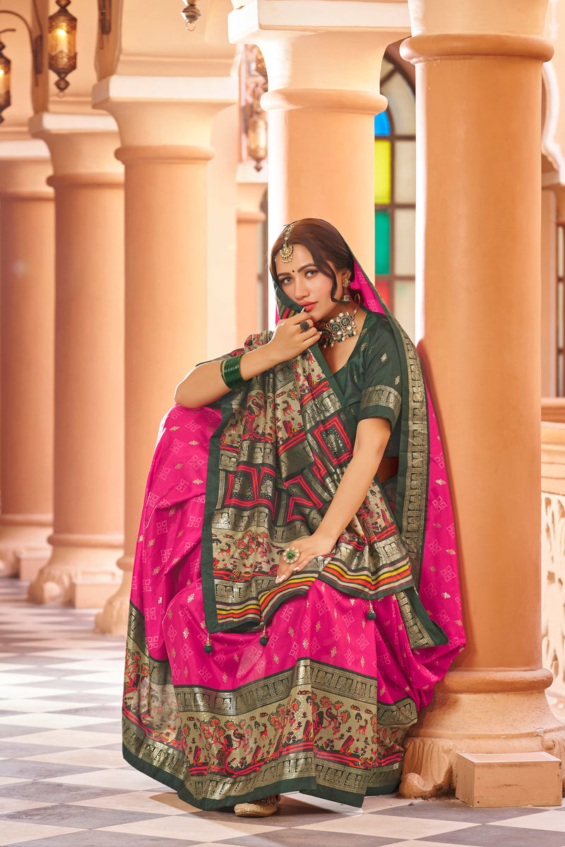 Rani pink color patola silk saree with foil printed work