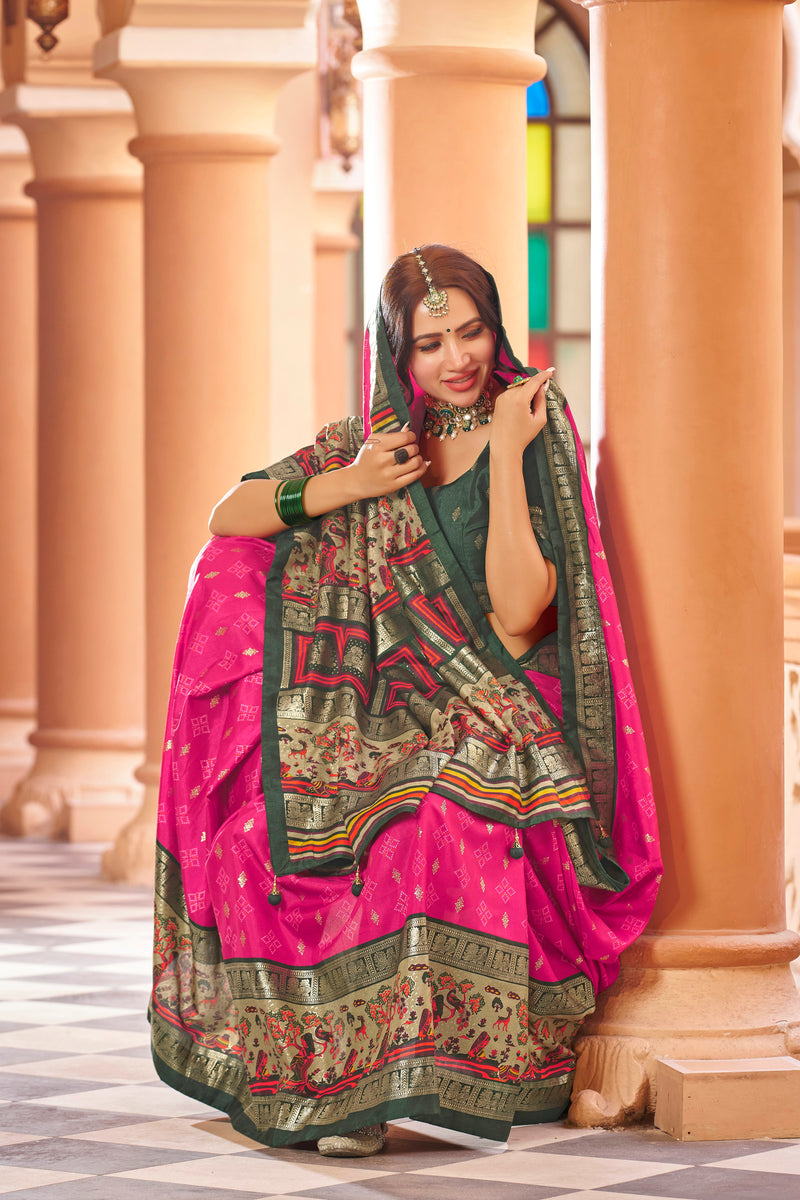 Rani pink color patola silk saree with foil printed work