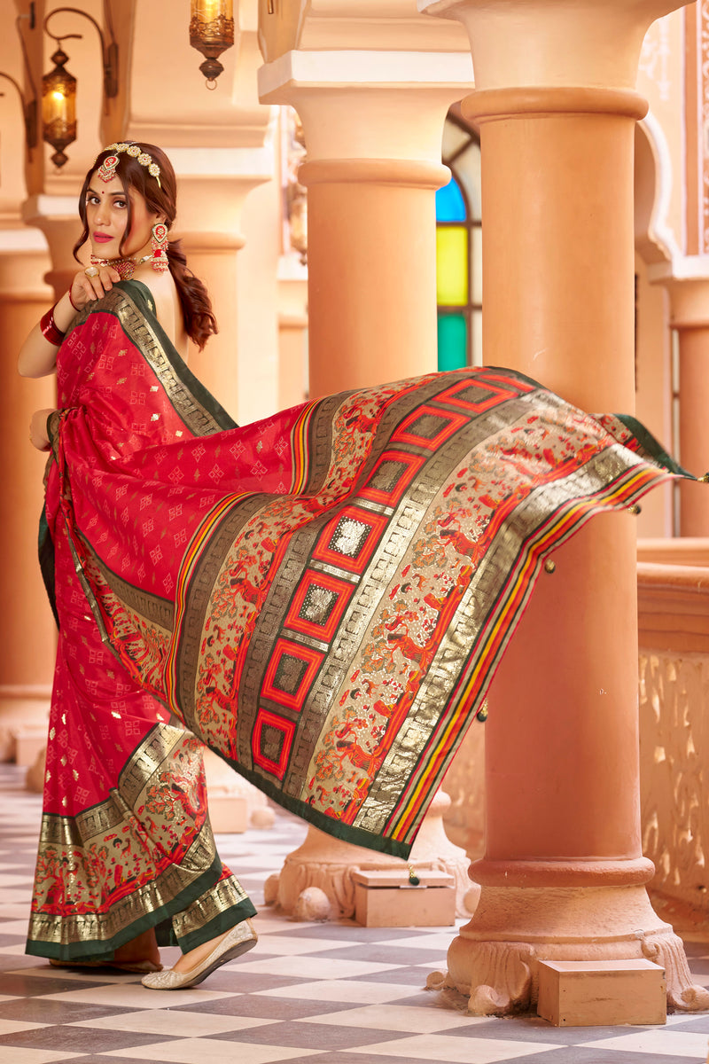 Red color patola silk saree with foil printed work