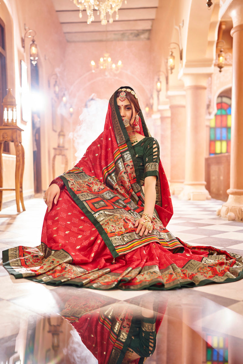 Red color patola silk saree with foil printed work