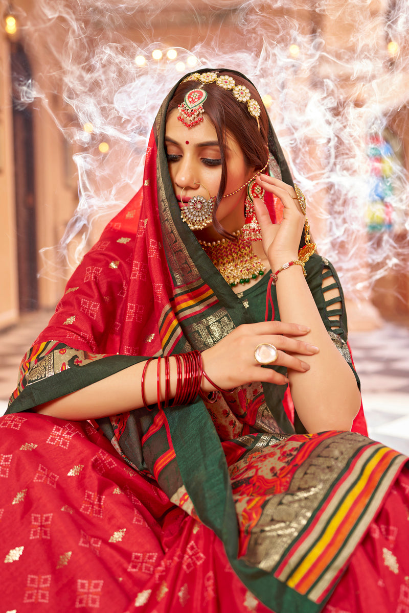 Red color patola silk saree with foil printed work