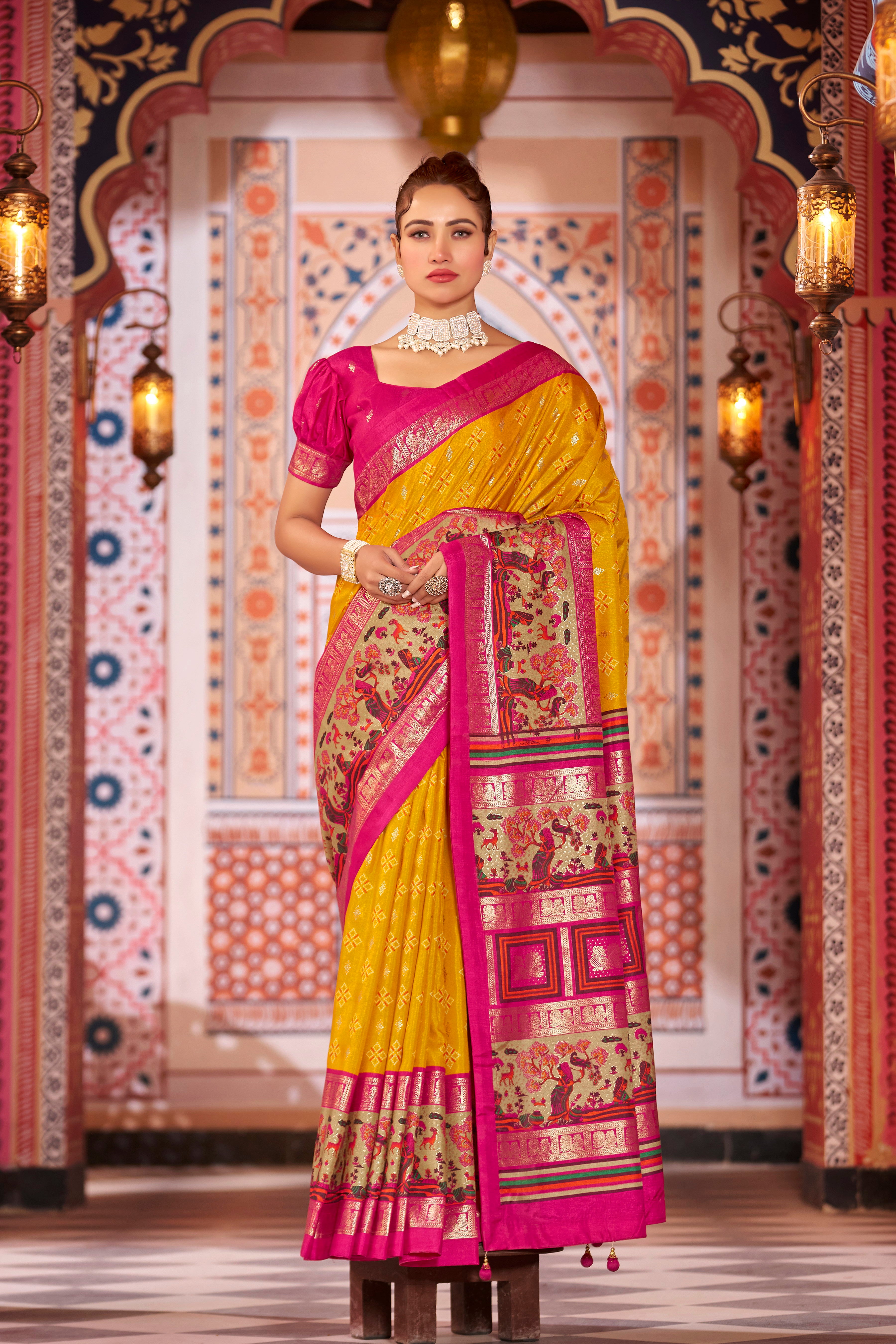 Yellow color patola silk saree with foil printed work