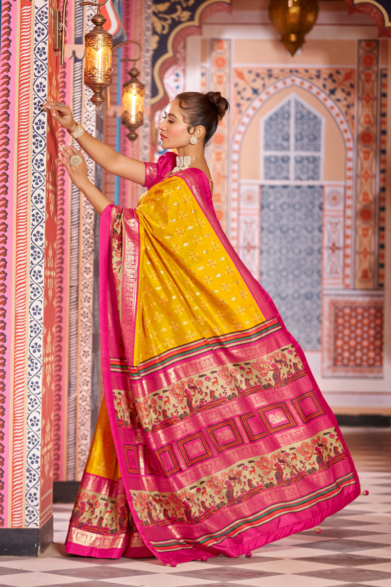 Yellow color patola silk saree with foil printed work