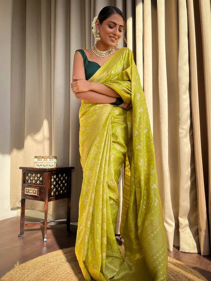 LIGHT MEHENDI GREEN PURE SOFT SILK SAREE WITH TWIRLING BLOUSE PIECE