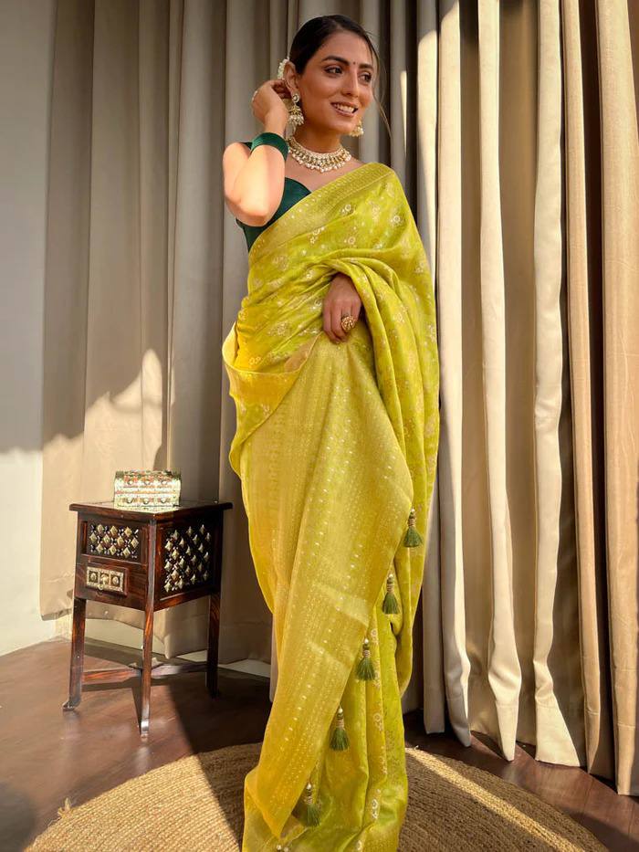 LIGHT MEHENDI GREEN PURE SOFT SILK SAREE WITH TWIRLING BLOUSE PIECE