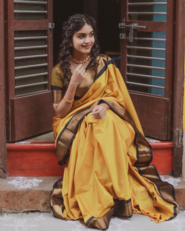 MUSTARD YELLOW WITH BLACK BRODER & BLOUSE WEAVED WITH GOLDEN ZARI