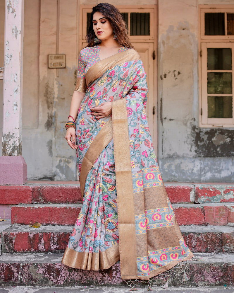 Pure silk digitally printed saree weaved with golden zari comes with tassels